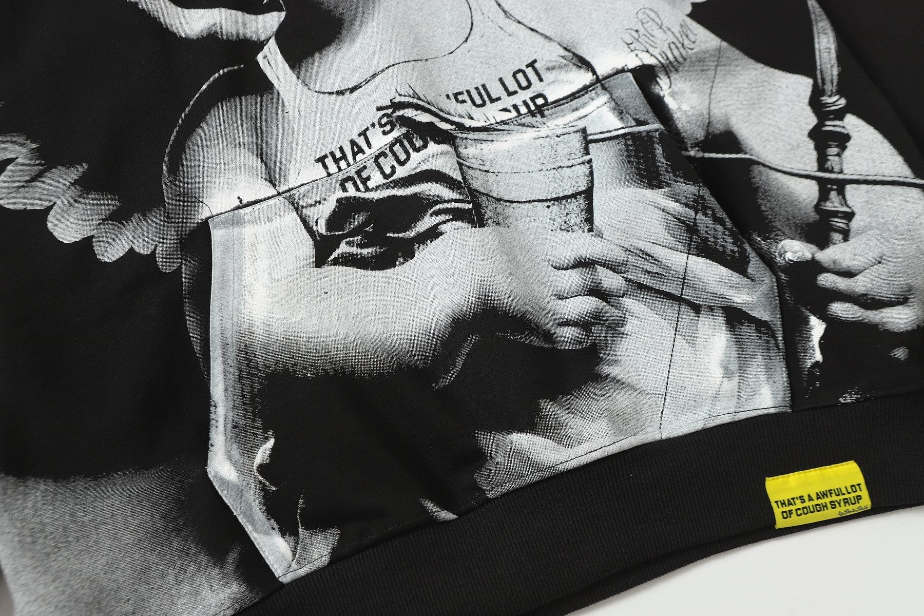 THAT'S A AWFUL LOT OF COUGH SYRUP Angel Tears Graphic Hoodie — detail