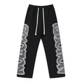MIXED EMOTION Black Ornamental Graphic Sweatpants — hero