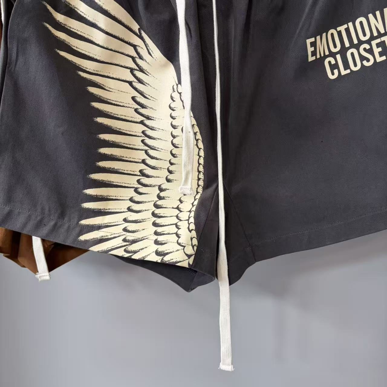 Emotional Closet Wing Graphic Drawstring Shorts — detail